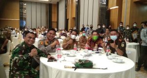 Bupati Banyuasin H  Askolani Jasi SH MH saat menghadiri Rapat Koordinasi Forum Koordinasi Pimpinan Daerah (Forkopimda) Provinsi dan Kabupaten Kota se-Sumatera Selatan Tahun 2021